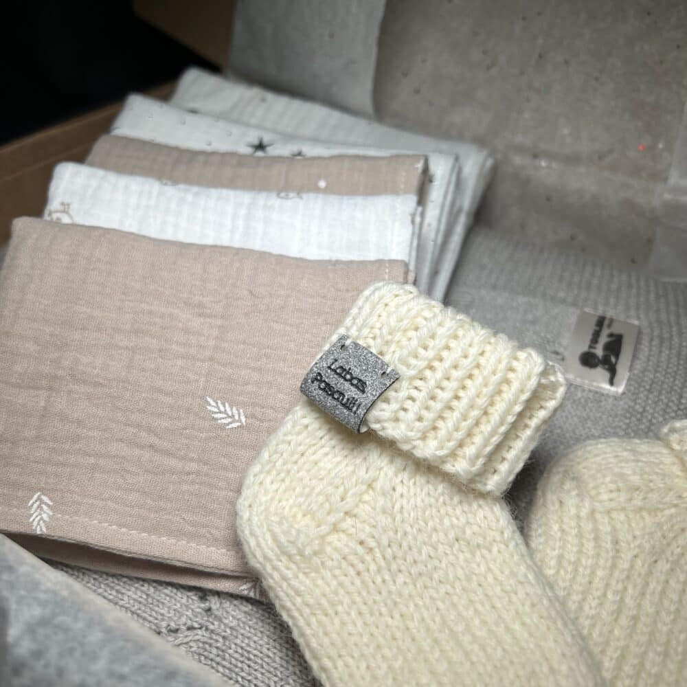 Vilnonės kojinytės “Šviesios” 0-3mėn.